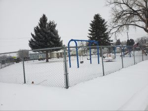 Chain-Link Fence: The Disadvantages playground shot in snow